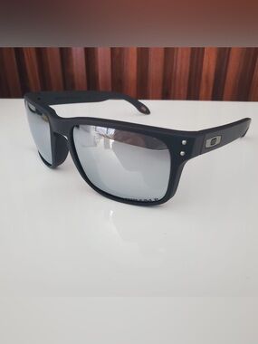 Oakley Black Frame Sunglasses with Silver Mirror Lenses
